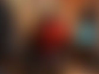 Mascot inside Yallapod’s Dubai podcast studio, seated in a modern podcast studio Dubai setup.