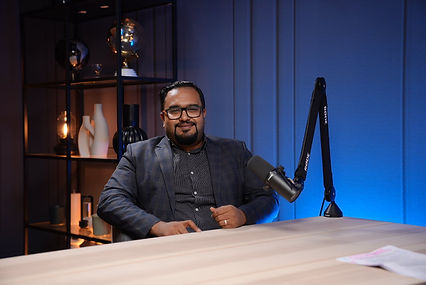 Business style podcast setup with male guest podcast studio Dubai at Dubai podcast studio
