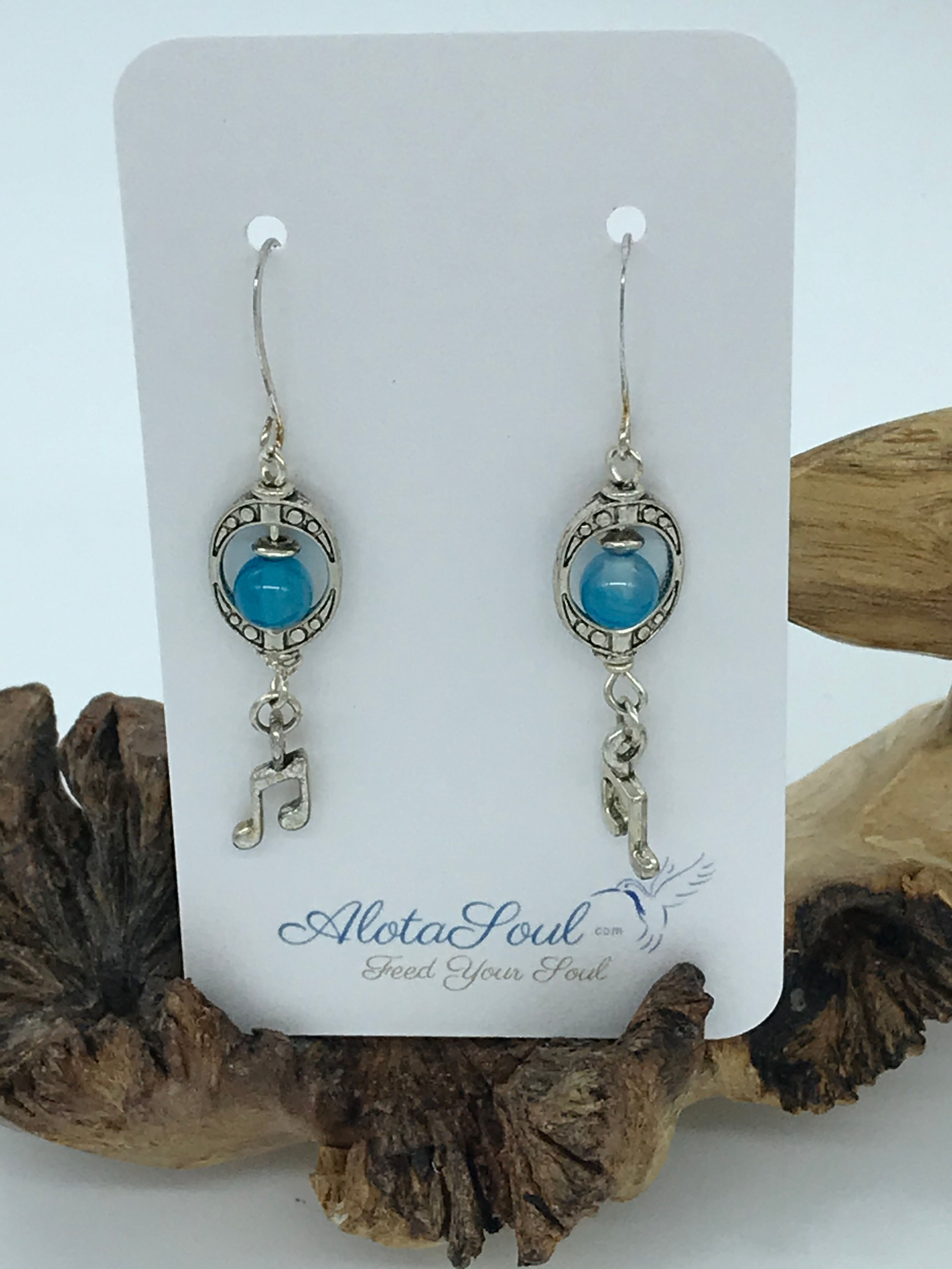 Music note and blue gemstone