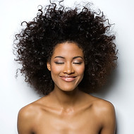 Portrait of a Smiling Woman with Curly Hair_edited_edited.jpg