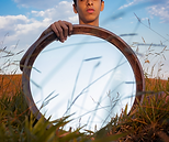 man holding a mirror