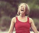 woman standing in the rain