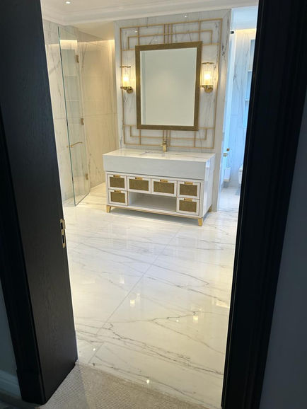 Calacatta bookmatched bathroom