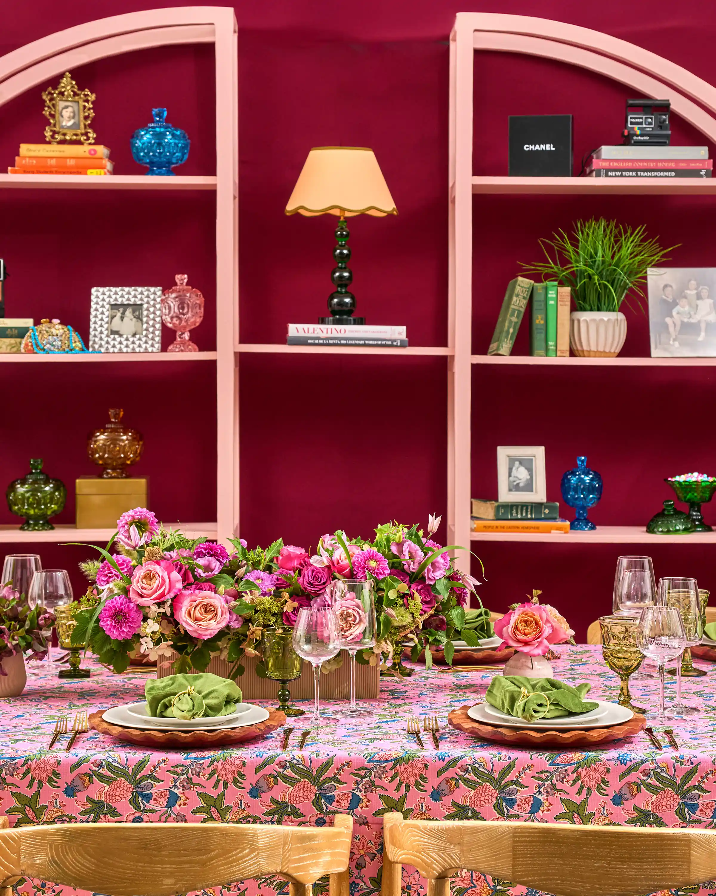 Vibrant, vintage tablescape featuring pinks, greens, and deep jewel tones
