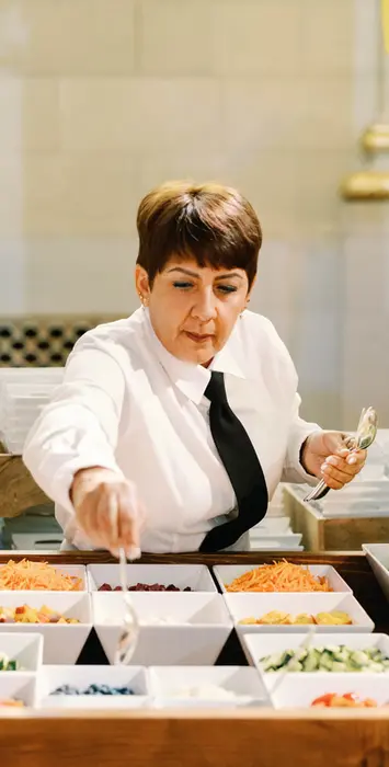 Server at salad bar
