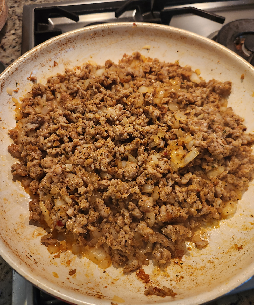 Cooked chicken sausage with minced garlic, chopped onion, and Hippy All-Purpose Seasoning.