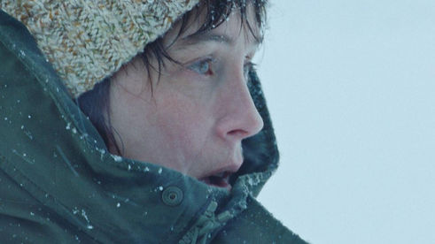 A girl freezing in snow