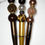 Thumbnail: Three decorative pens: brown, leopard and metallic gold with pearl details on white