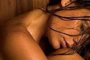Lady sweating in sauna