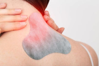 lady with axial cervico-upp thoracic shoulder spine pain sticking pain plasters  