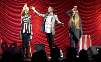 Magician performs on stage at corporate event in the san jose bay area