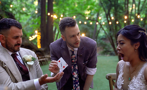 Bride is amazed by close up magician at wedding in San Jose CA