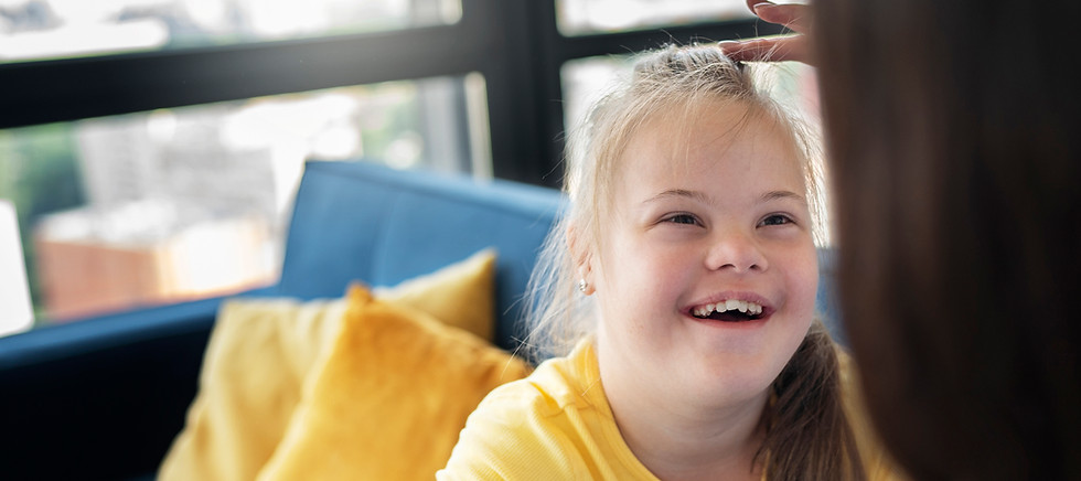 high-angle-smiley-girl-with-down-syndrome.jpg