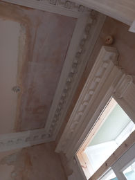 Cornice and archway restoration.