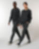 Male and female walking together Crew neck jumper track pants.jpg