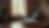 Eye-level view of a cozy office with a comfortable chair and a small table with a Bible