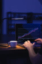 broker-looking-laptop-analyzing-stock-market-invest-trading-stocks-graph.jpg