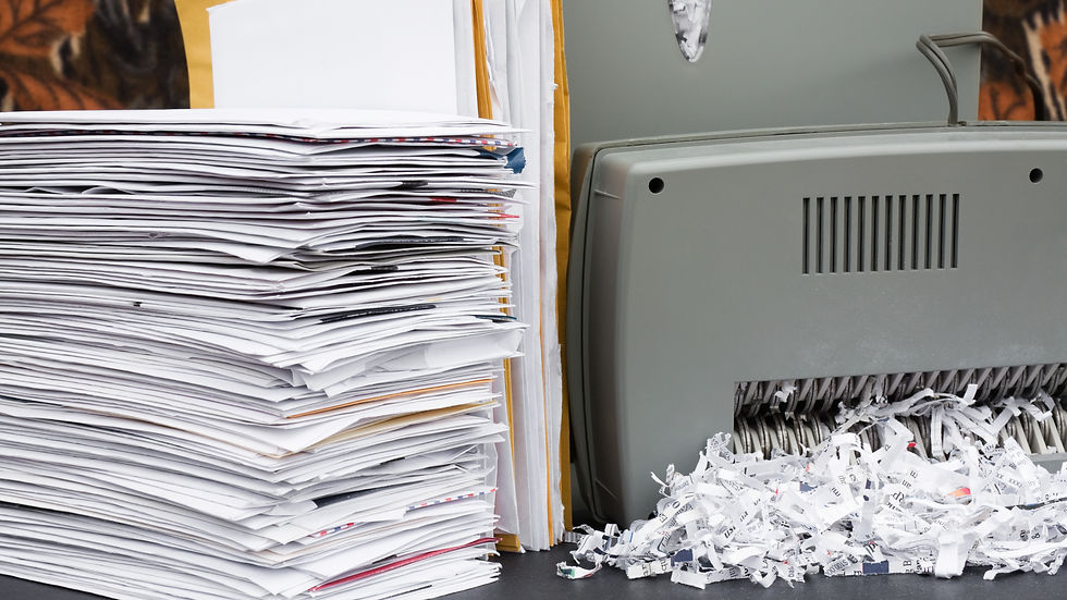 Paper being shredded.