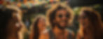 man-with-beard-sunglasses-smiles-camera-with-woman-smiling-front-him_edited.jpg