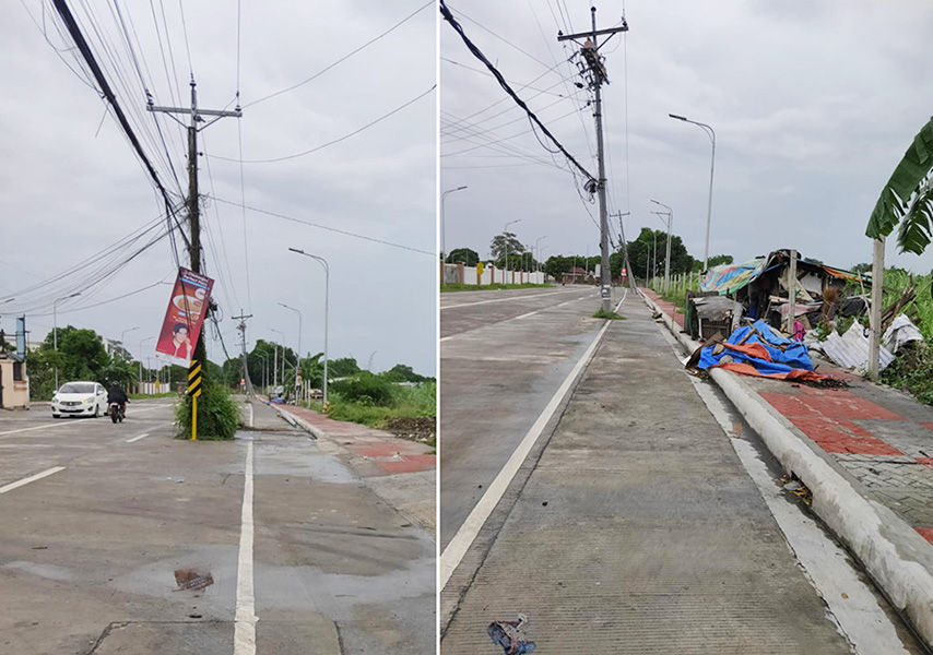 Mga ulang na poste kan Casureco II sa tahaw kan pinahiwas na tinampo kan DPWH sa Barangay Balatas pasiring sa Barangay Cararayan pinapahale kan City Hall. (Bicol Mail)
