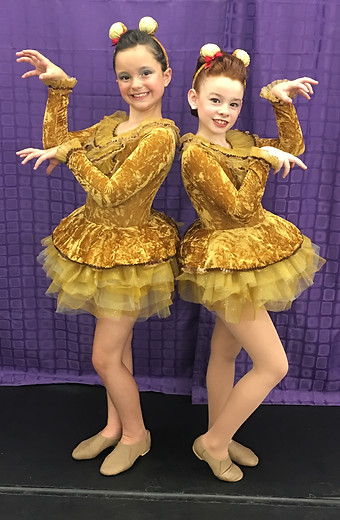 little girls posing with dance costume