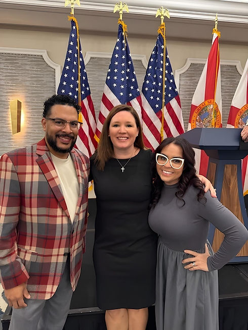 Pastor Palfert Santiago and his wife Laurely stand side by side with Republican Party of Florida Chair of Chairs, Erin Huntley (center).jpeg