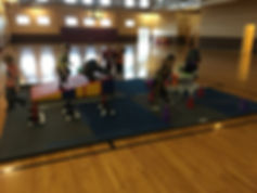 little kids learning gymnastics