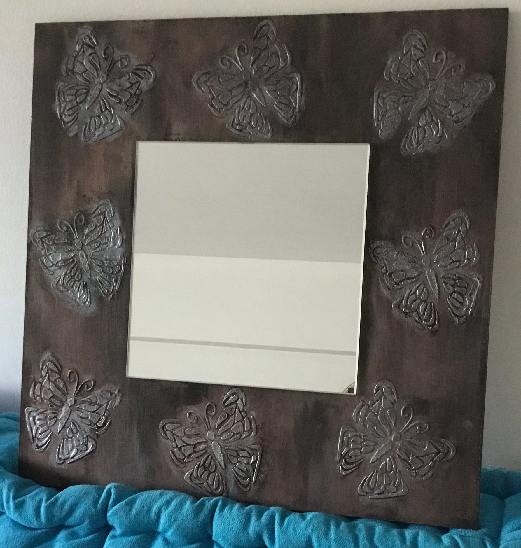 Espejo con relieve