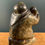Thumbnail: Inuit Stone Figure with a Seal by Joshua Joe.