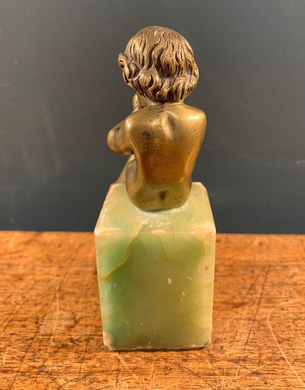 Thumbnail: Cute Little Flute Playing Cherub on an Onyx Base.