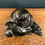 Thumbnail: Inuit Stone Figure with a Seal by Joshua Joe.