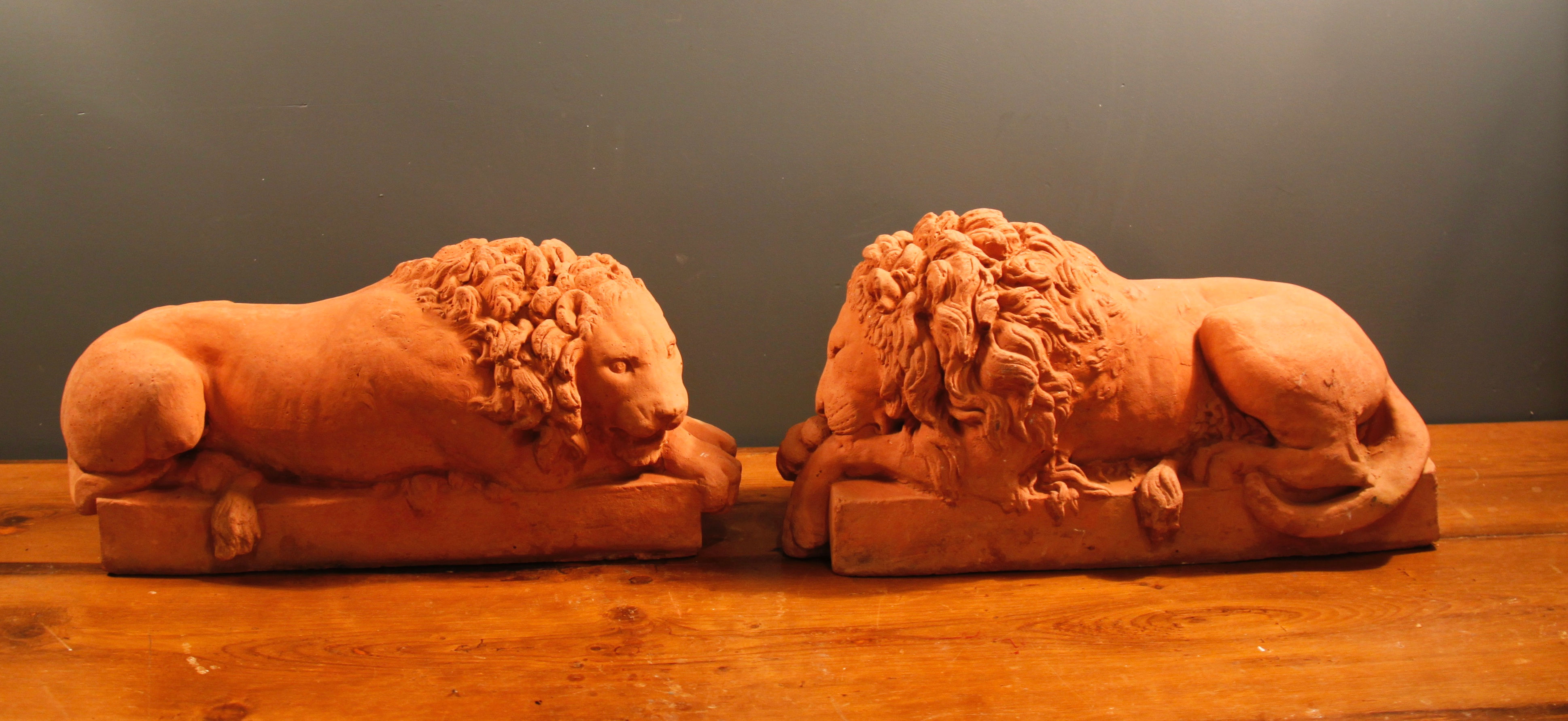 Beautiful Pair of Lions (not identical) Terracotta