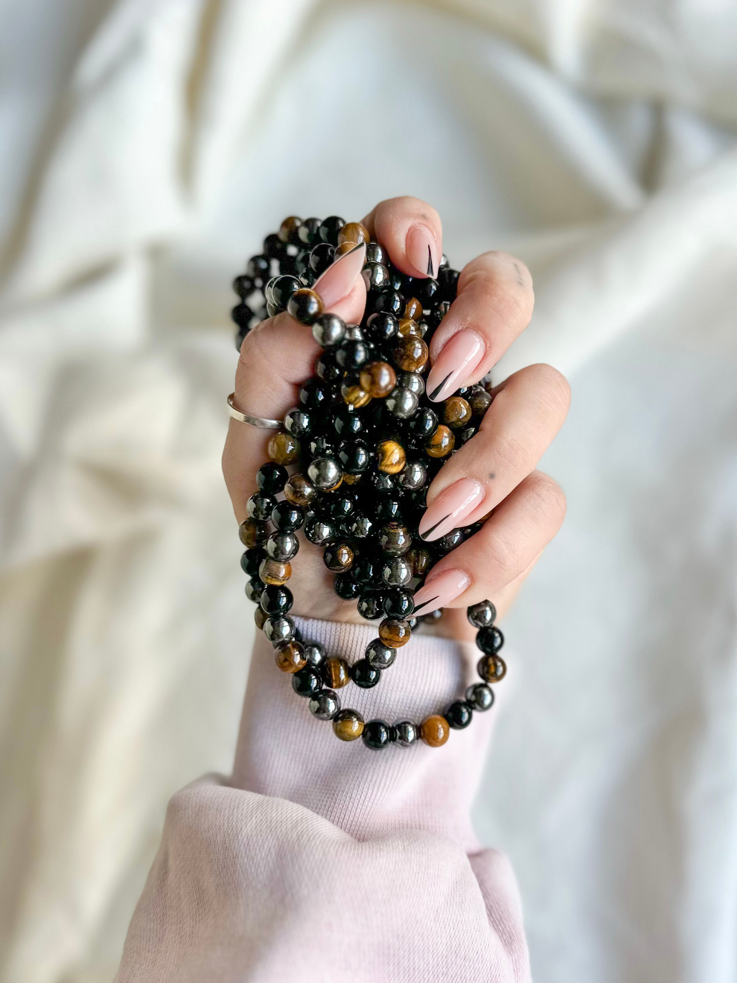 Pulseira proteção tripla: Olho de Tigre, Hematite e Ónix
