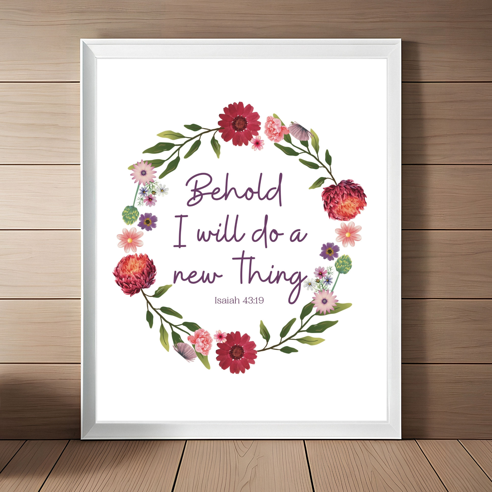 Beautiful art print with a floral wreath in lovely lavender, fuchsia, and sage.  It has text in the center that reads "Behold I do a new thing" from Isaiah. 