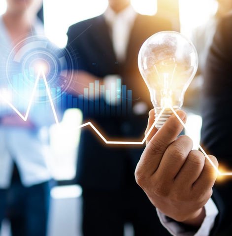 Professional holding light bulb.