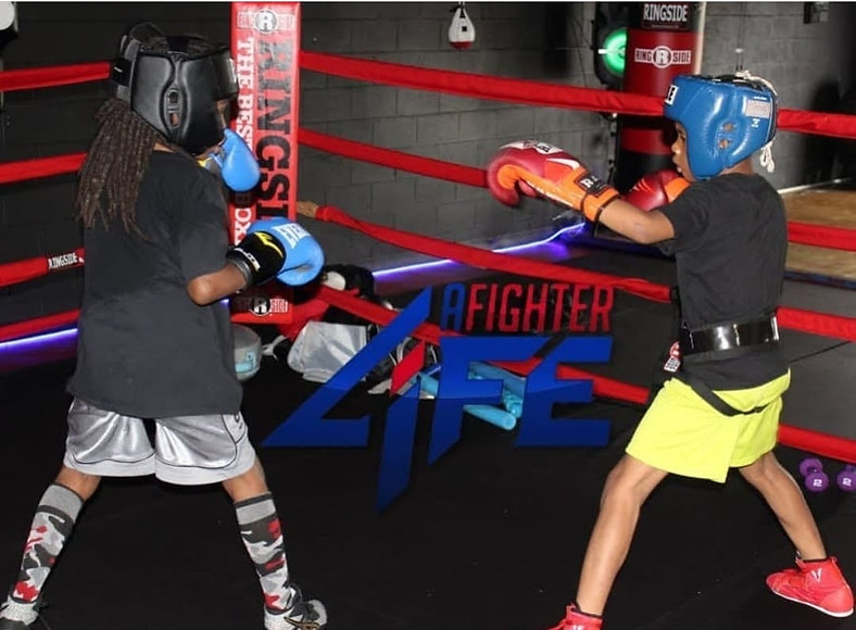 A Fighter kids sparring.jpeg