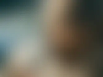 Woman drinking a cup of Triphala for digestion.