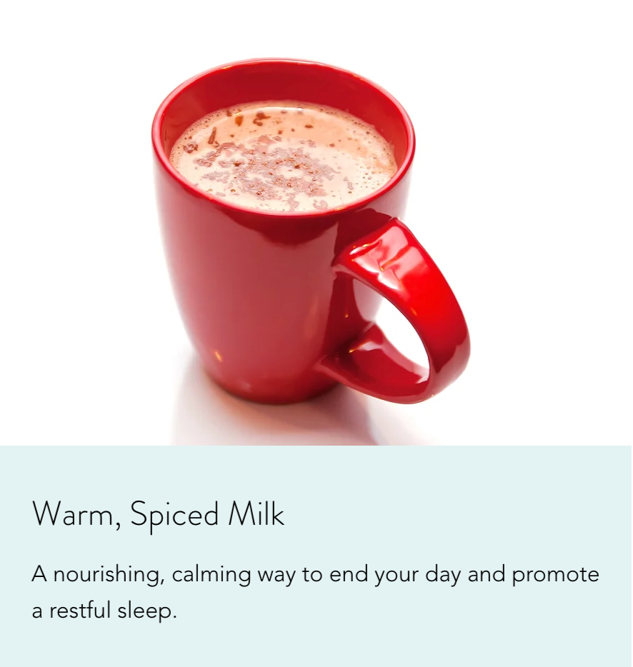 Ayurvedic remedies for constipation: a red cup with warm, spiced milk