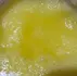 Close-up macro texture of golden organic ghee for internal menopausal dryness remedies
