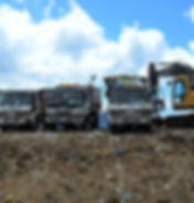 Trucks sorting recycled goods