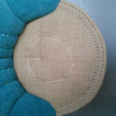 hare in the chair - stitched round seat.jpeg