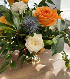 Blue and orange wedding centerpiece