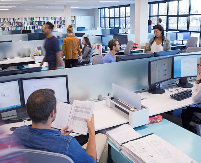 People Working in Open Office