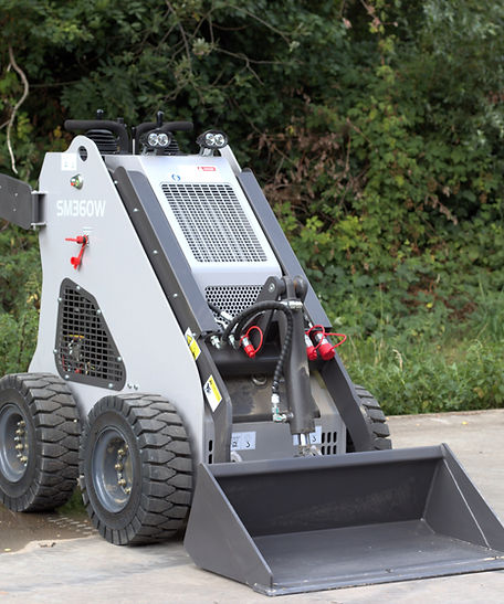 Skidmate SM-360 mini skidsteer met een grondbak