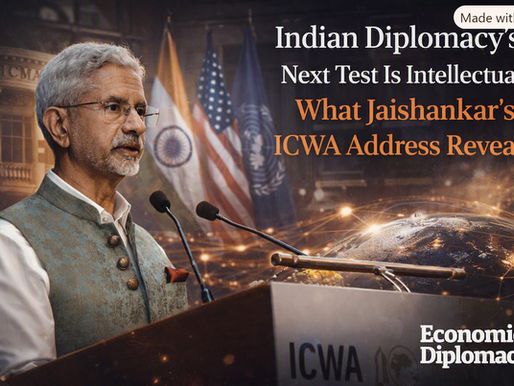 External Affairs Minister S. Jaishankar speaks at the Indian Council of World Affairs podium in New Delhi, wearing a traditional Nehru jacket and white shirt. Behind him, Indian, U.S., and U.N. flags form a diplomatic backdrop with a subtle glowing globe and network lines symbolizing global connectivity. The lighting is cinematic, highlighting Jaishankar’s focused expression. The headline “Indian Diplomacy’s Next Test Is Intellectual: What Jaishankar’s ICWA Address Reveals” appears in bold white and orange text, and the Economic Diplomacy.in logo is placed discreetly at the bottom right.