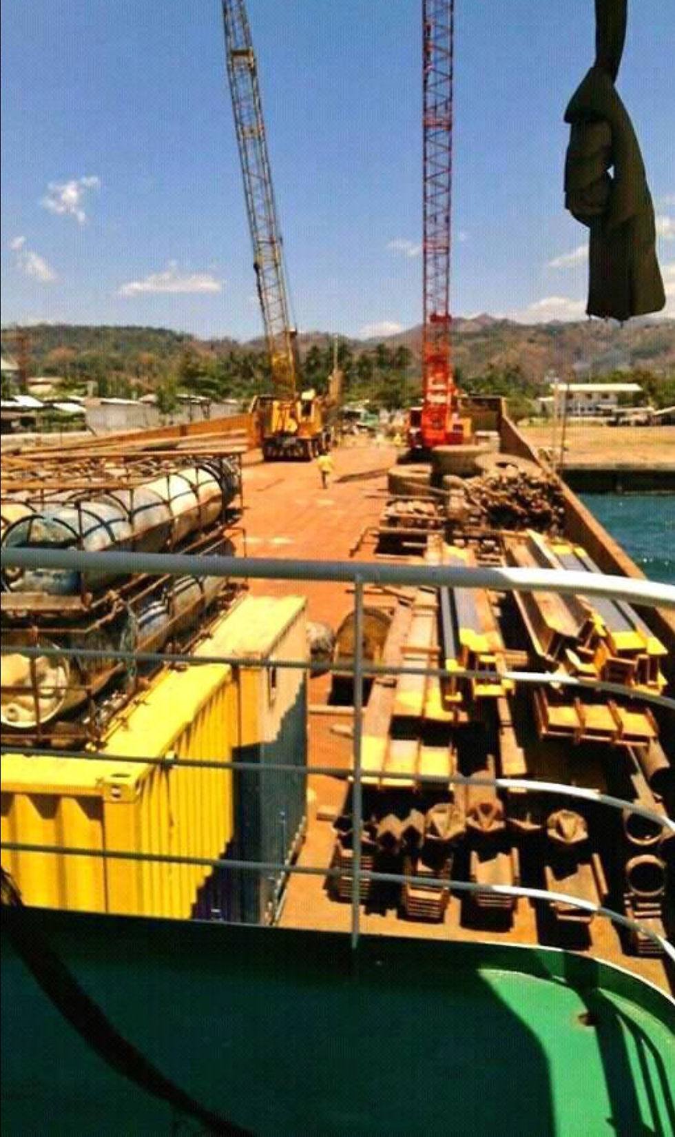 Challenger transporting construction mat