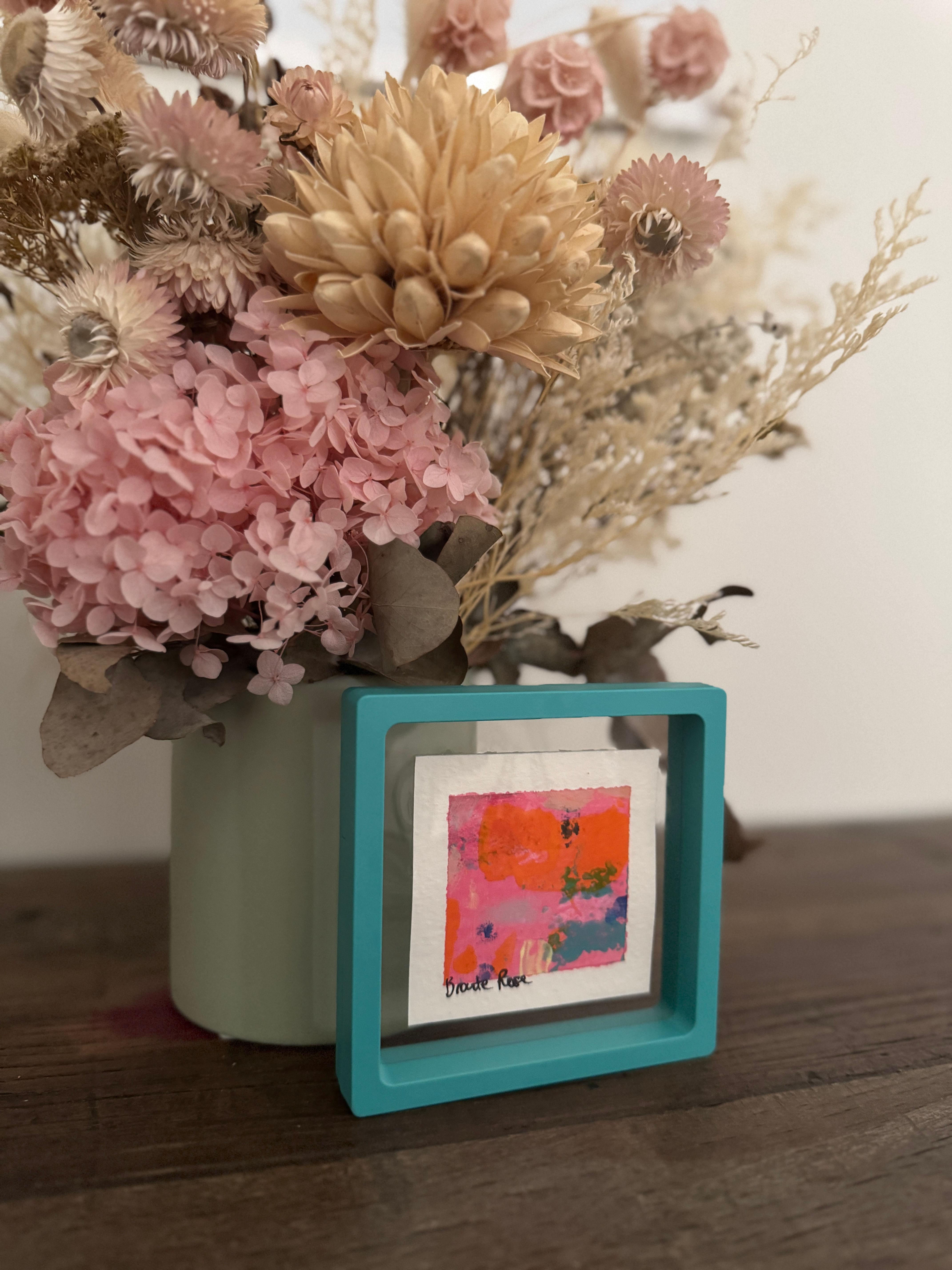 Mini abstract artwork in turquoise frame