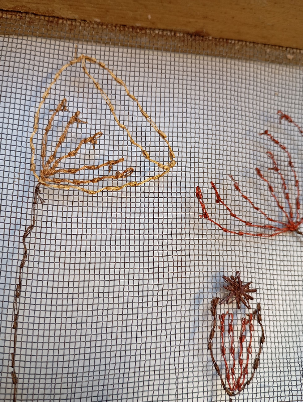 Thumbnail: close up of Textile artwork, hand embroidered seed heads directly into a square wooden vintage sieve.