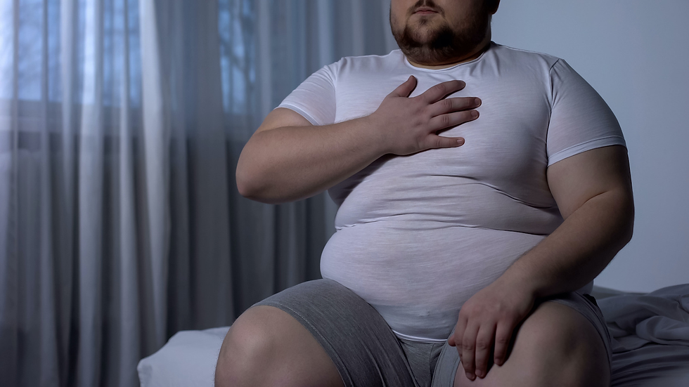 Natural GERD treatment - man with hand to chest