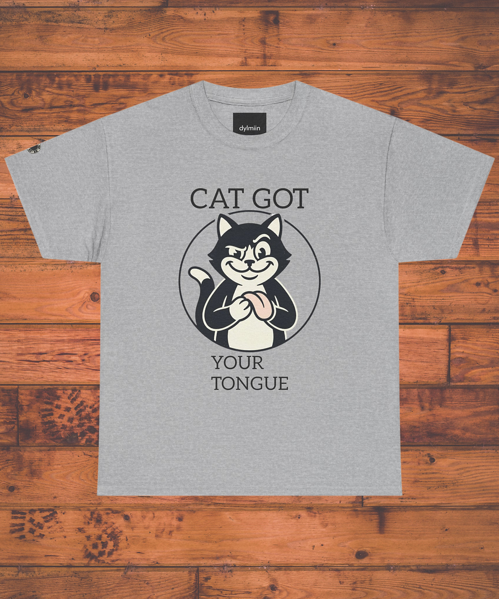 Gray T-shirt on wooden background with cartoon cat and text CAT GOT YOUR TONGUE; playful, smug expression